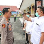Tangkal Corona, Polres Ngawi Deteksi Suhu Tubuh Pengunjung dan Anggota