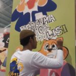 Pelajar di Surabaya Ini Bikin Mural ‘Percuma Lapor Polisi’